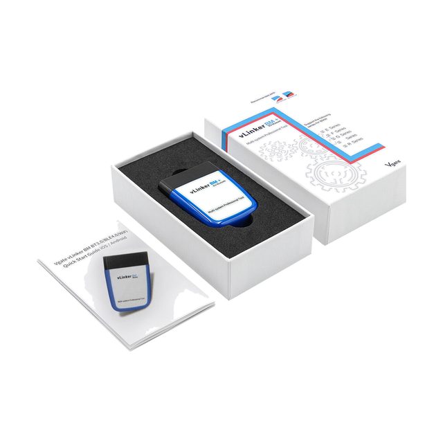 Μπλε και λευκό Vgate vLinker BM+ μέσα στην ανοιχτή συσκευασία του, δίπλα στο εγχειρίδιο